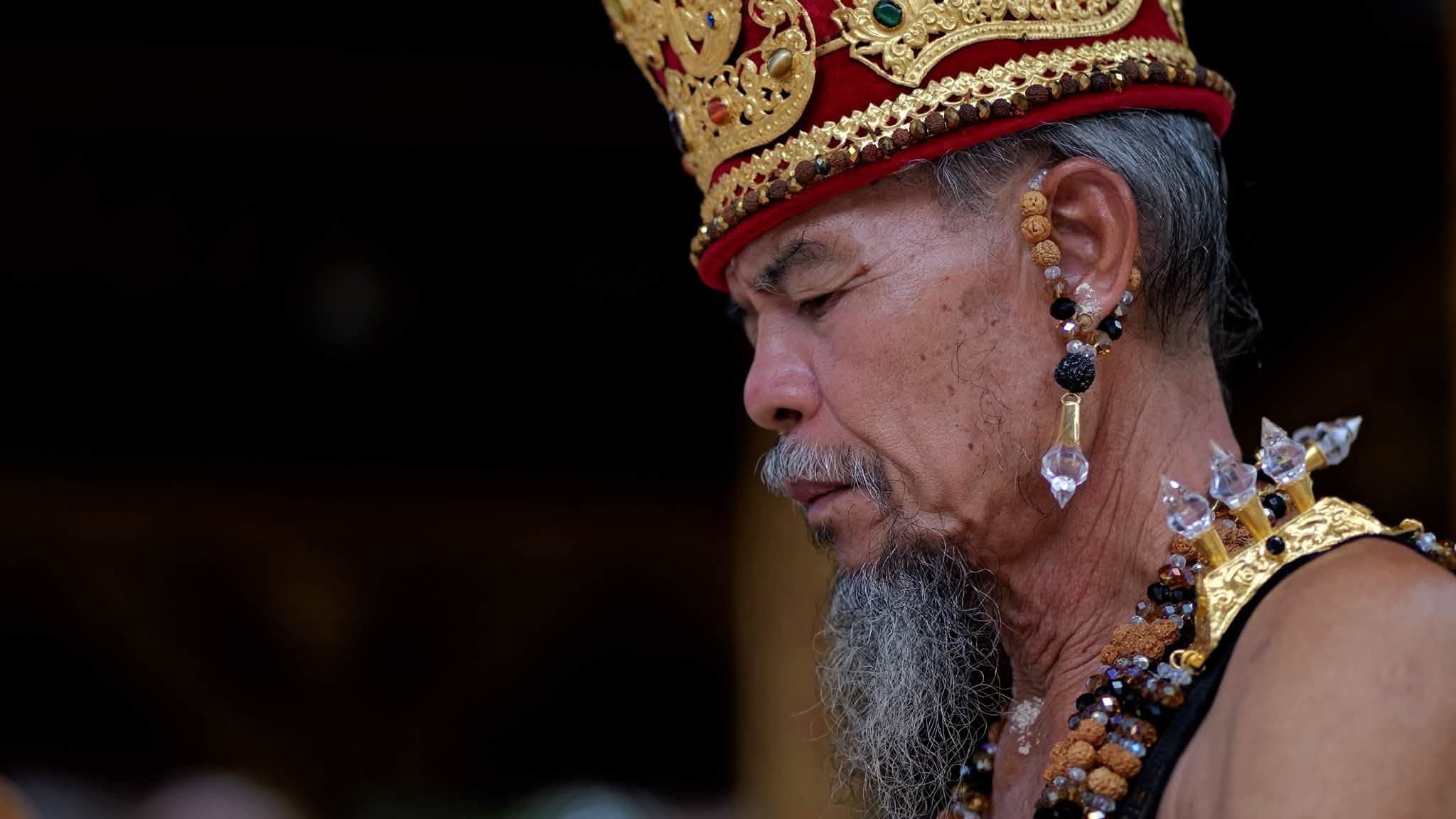 An elder in traditional ceremonial dress